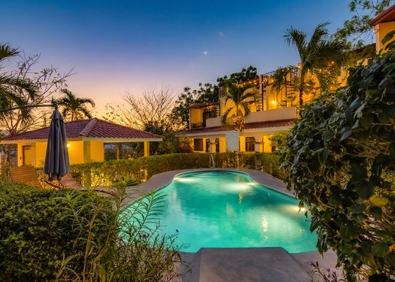 Home with pool at dusk